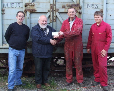 Cheque presentation to Laxey & Lonan Heritage Trust